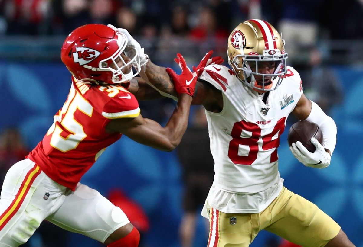 Feb 2, 2020; Miami Gardens, Florida, USA; San Francisco 49ers receiver Kendrick Bourne (84) runs after a reception against Kansas City Chiefs cornerback Charvarius Ward (35) in Super Bowl LIV at Hard Rock Stadium. Mandatory Credit: Matthew Emmons-Imagn Images