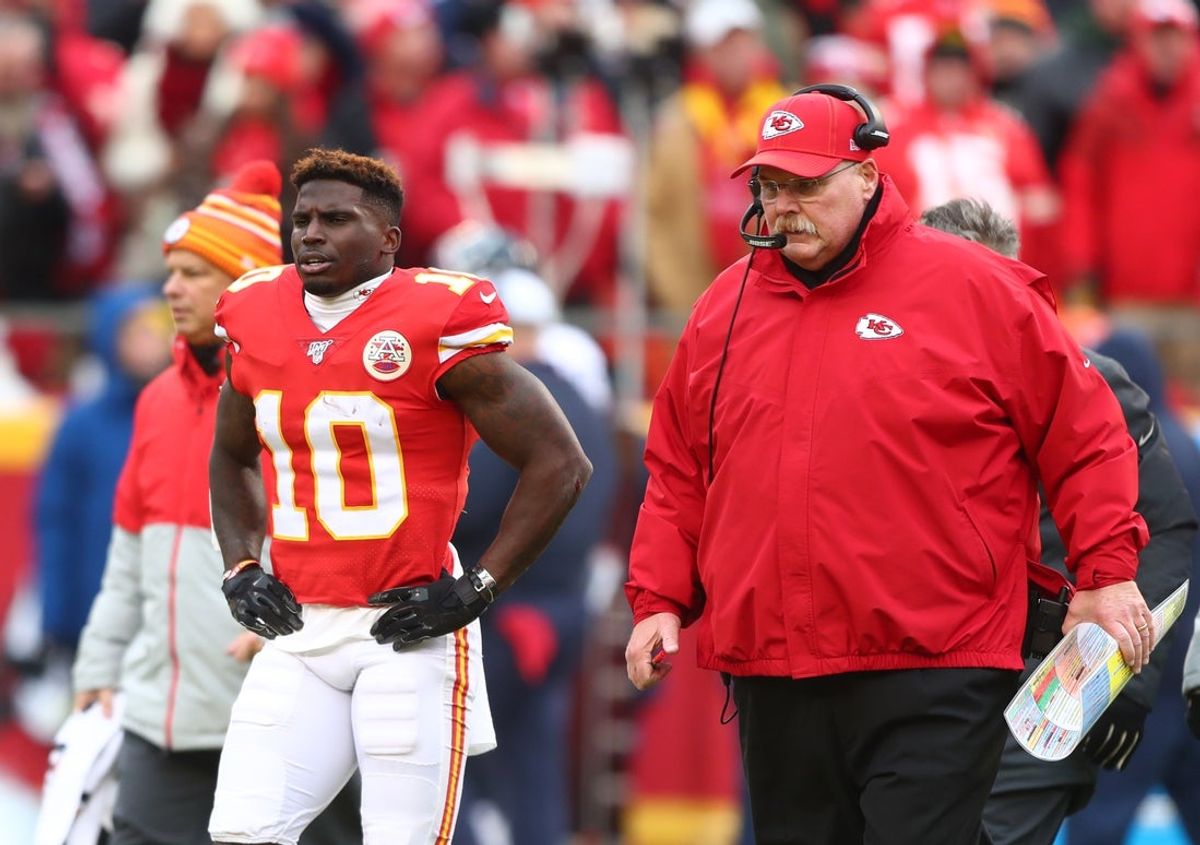 Jan 12, 2020; Kansas City, Missouri, USA; Kansas City Chiefs wide receiver Tyreek Hill (10) and head coach Andy Reid against the Houston Texans in the AFC Divisional Round playoff football game at Arrowhead Stadium. Mandatory Credit: Mark J. Rebilas-Imagn Images