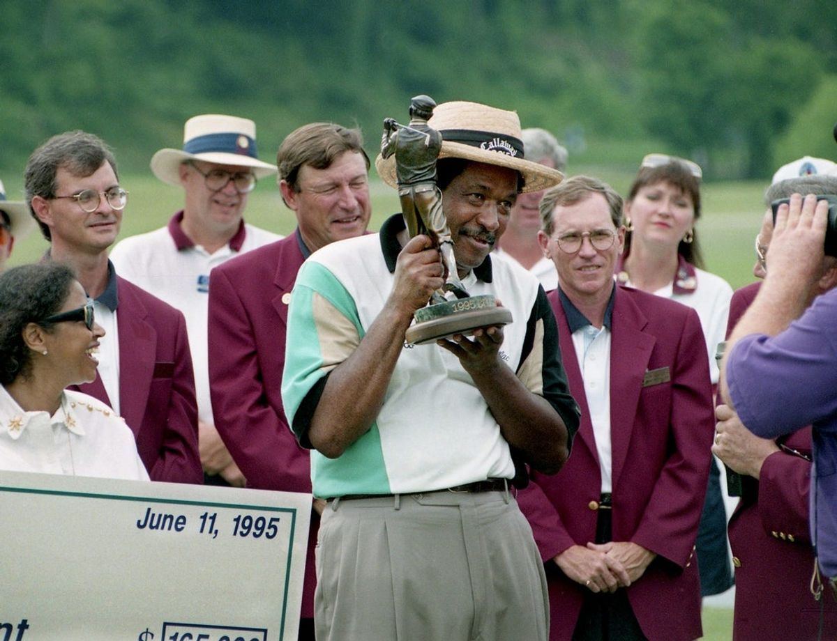 Senior Tour star Jim Dent shows off the trophy for winning the second annual BellSouth Senior Classic with a 54-hole total of 205, 13-under-par at Opryland's Springhouse Golf Course on June 11, 1995. It was Dent's first Senior Tour title of the year and brought him the biggest check of his 25-year tour golf career with a $165,000 payout.