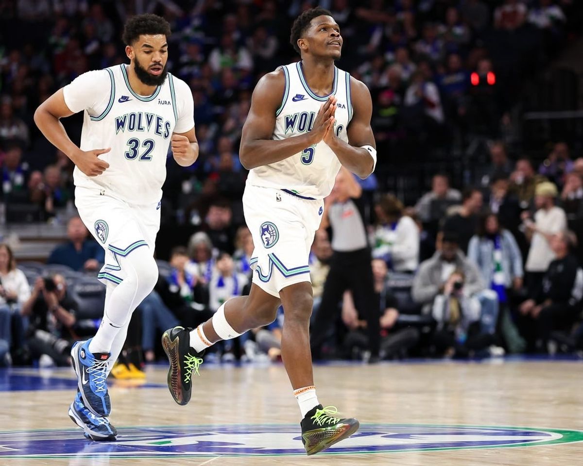 Feb 24, 2024; Minneapolis, Minnesota, USA; Minnesota Timberwolves guard Anthony Edwards (5) celebrates his three-point basket against the Brooklyn Nets during the second half at Target Center.