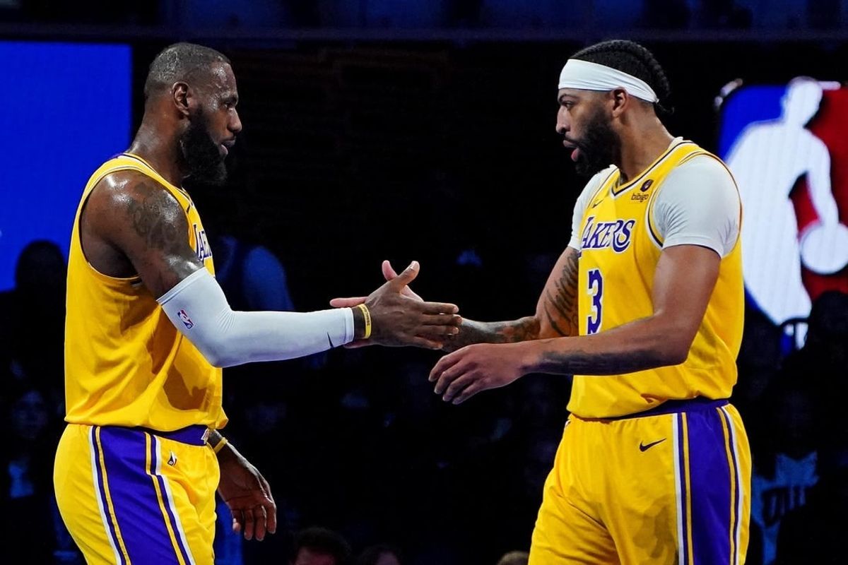 Dec 7, 2023; Las Vegas, Nevada, USA; Los Angeles Lakers forward LeBron James (23) celebrates with forward Anthony Davis (3) during the third quarter against the New Orleans Pelicans in the NBA In Season Tournament Semifinal at T-Mobile Arena.