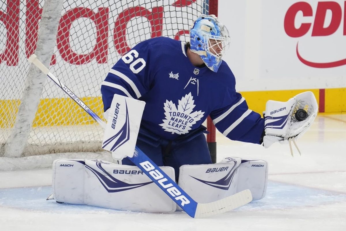 Feb 29, 2024; Toronto, Ontario, CAN; Toronto Maple Leafs goaltender Joseph Woll (60) makes a save during warm up before a game against the Arizona Coyotes at Scotiabank Arena.