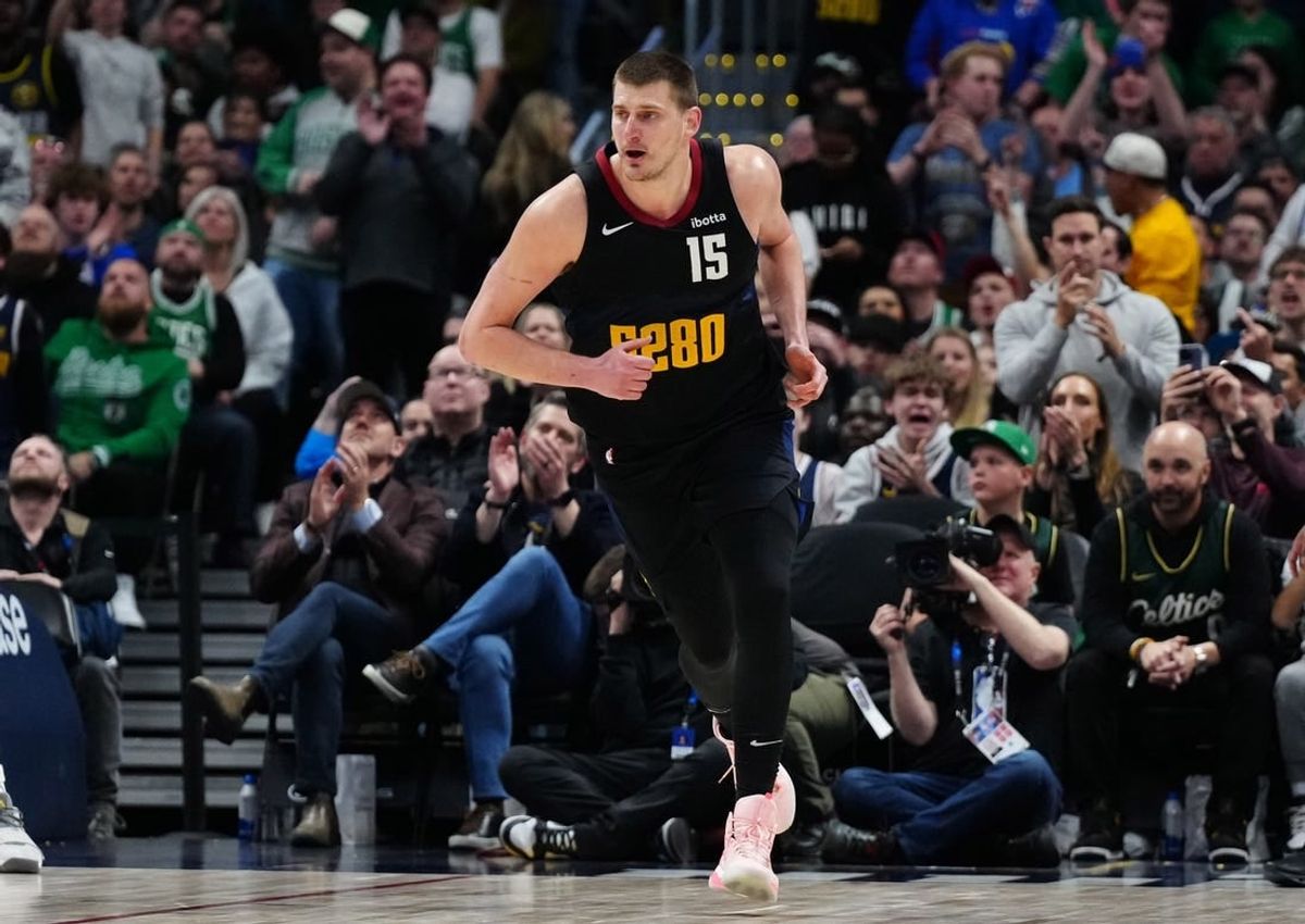 Mar 7, 2024; Denver, Colorado, USA; Denver Nuggets center Nikola Jokic (15) following his score in the second half against the Boston Celtics at Ball Arena.