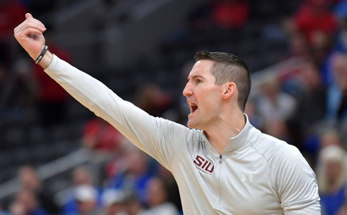 Mar 4, 2023; St. Louis, MO, USA;  Southern Illinois Salukis head coach Bryan Mullins directs his players during the second half against the Drake Bulldogs at Enterprise Center.