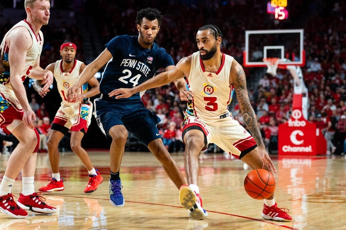 Feb 17, 2024; Lincoln, Nebraska, USA; Nebraska Cornhuskers guard Brice Williams (3) drives against Penn State Nittany Lions forward Zach Hicks (24) during the first half at Pinnacle Bank Arena.