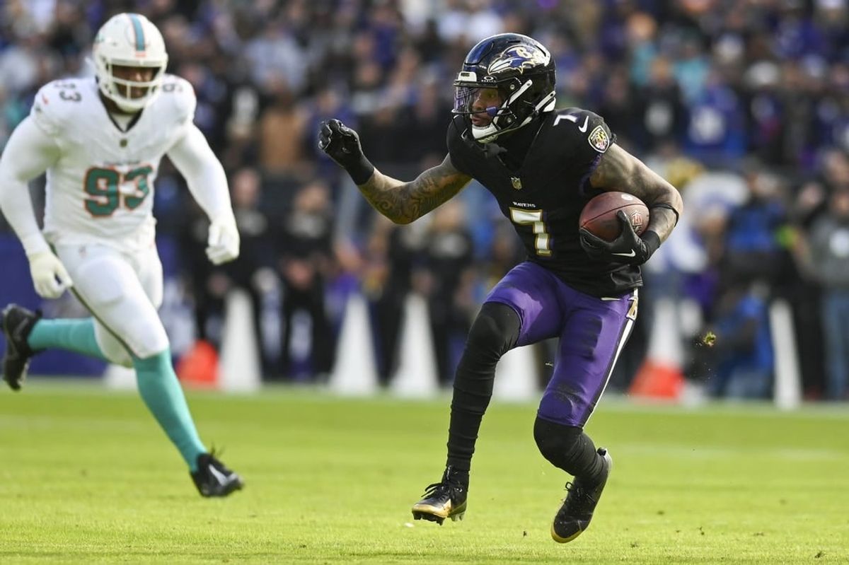 Dec 31, 2023; Baltimore, Maryland, USA; Baltimore Ravens wide receiver Rashod Bateman (7) runs after the catch during the first quarter  against the Miami Dolphins at M&T Bank Stadium.