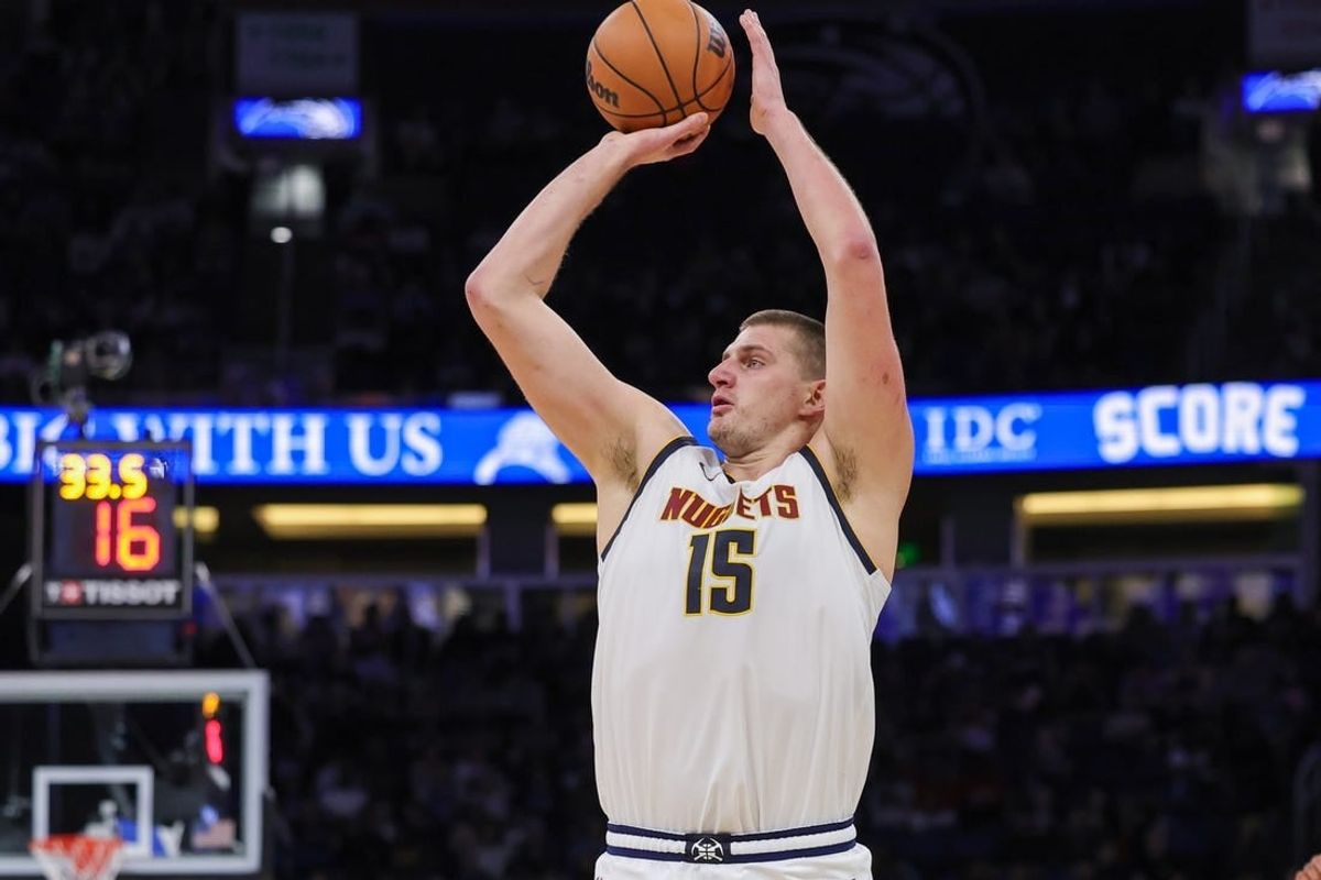 Nov 22, 2023; Orlando, Florida, USA; Denver Nuggets center Nikola Jokic (15) shoots the ball during the second quarter against the Orlando Magic at Amway Center.