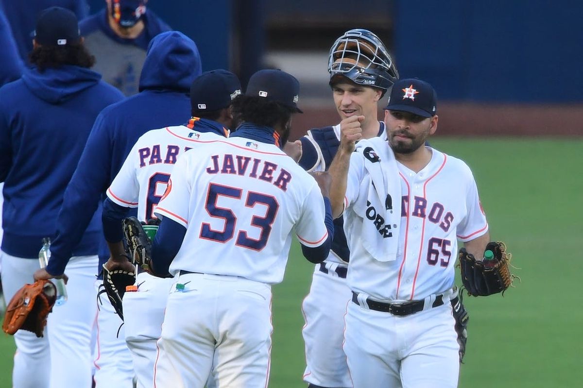 Oct 13, 2020; San Diego, California, USA; Houston Astros starting pitcher Jose Urquidy (65) greets relief pitcher Cristian Javier (53) before playing against the Tampa Bay Rays in game three of the 2020 ALCS at Petco Park. Mandatory Credit: Jayne Kamin-Oncea-USA TODAY Sports