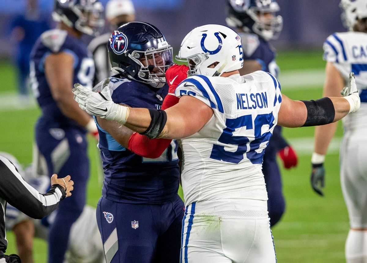 Quenton Nelson (56) of the Indianapolis Colts has a disagreement with Jeffery Simmons (98) of the Tennessee Titans after a physical play, Indianapolis Colts at Tennessee Titans, Nissan Stadium, Nashville, Thursday, Nov. 12, 2020. Colts won 34-17. An official came to separate the two, and no penalty was called.

78 Coltstitans Rs
