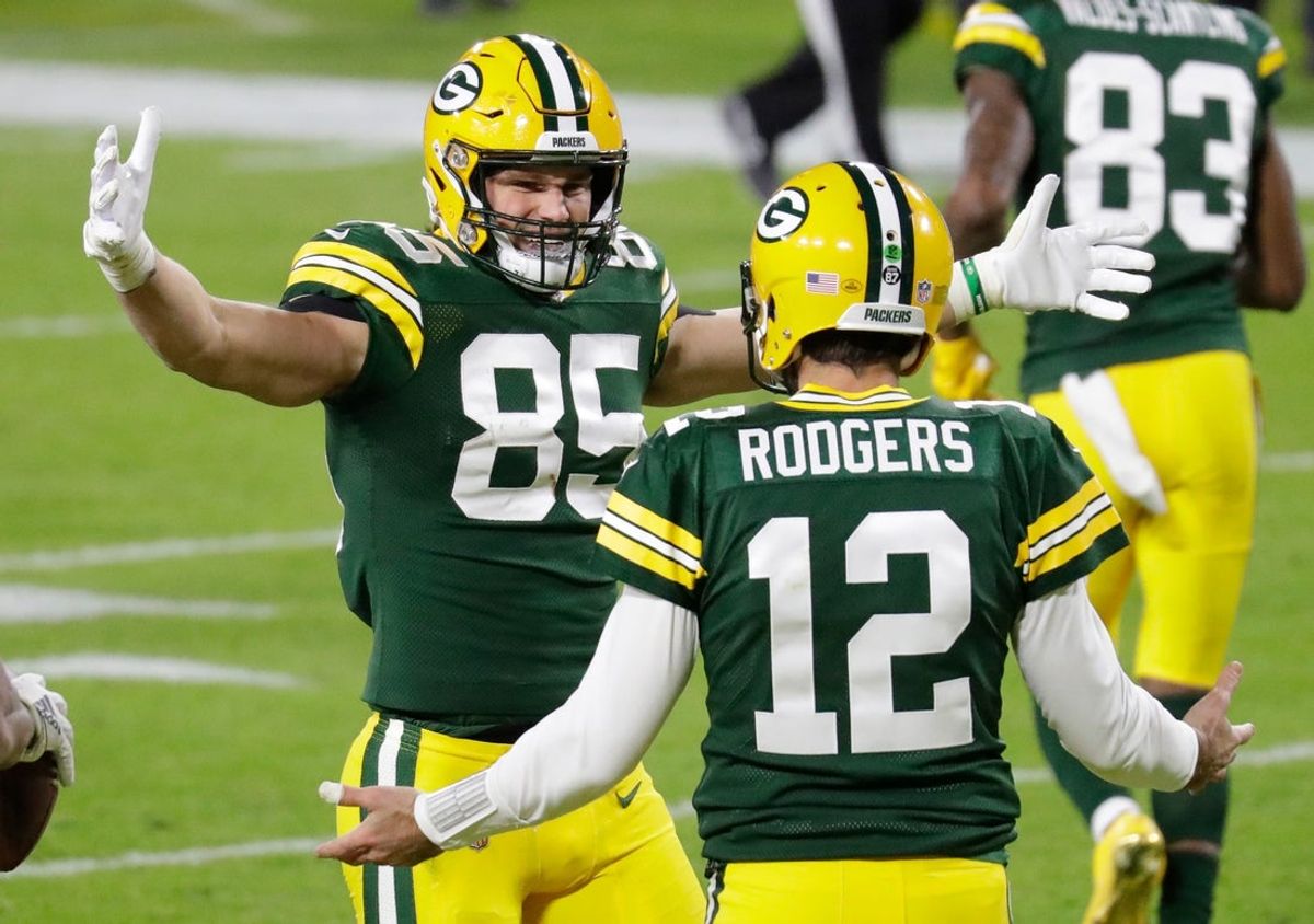 Green Bay Packers tight end Robert Tonyan (85) celebrates his touchdown reception with quarterback Aaron Rodgers (12) in the third quarter during their football game Sunday, Nov. 29, 2020, at Lambeau Field in Green Bay, Wis.

Apc Packvsbears 1129200754