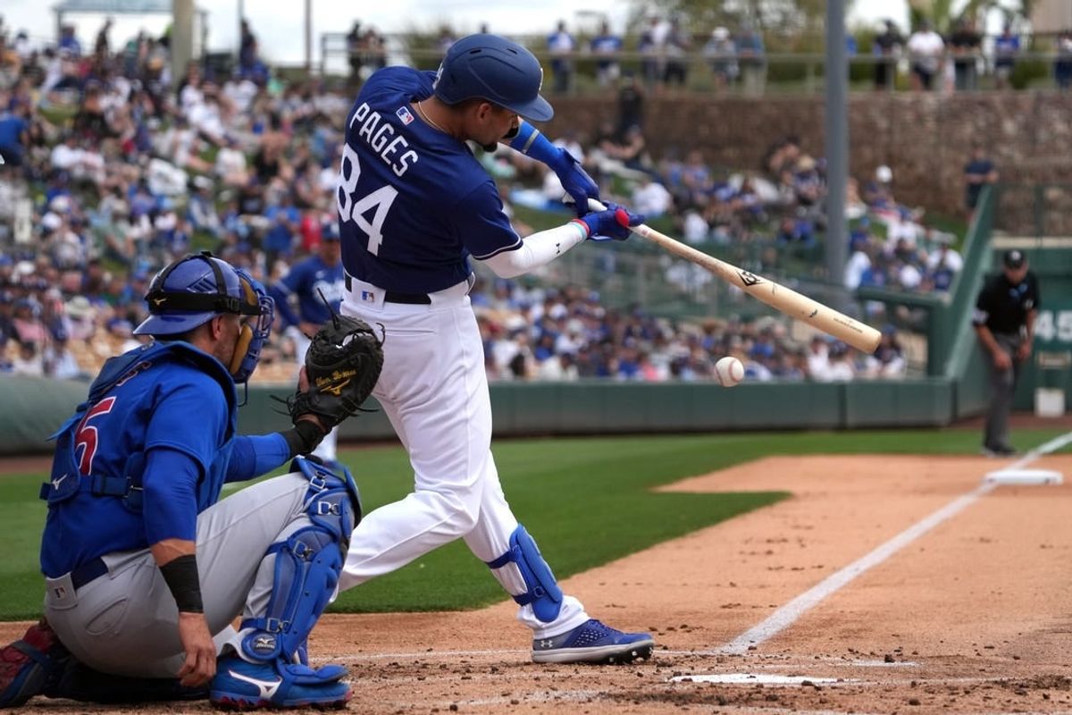 Mar 11, 2023; Phoenix, Arizona, USA; Los Angeles Dodgers right fielder Andy Pages (84) bats against the Chicago Cubs during the second inning at Camelback Ranch-Glendale.