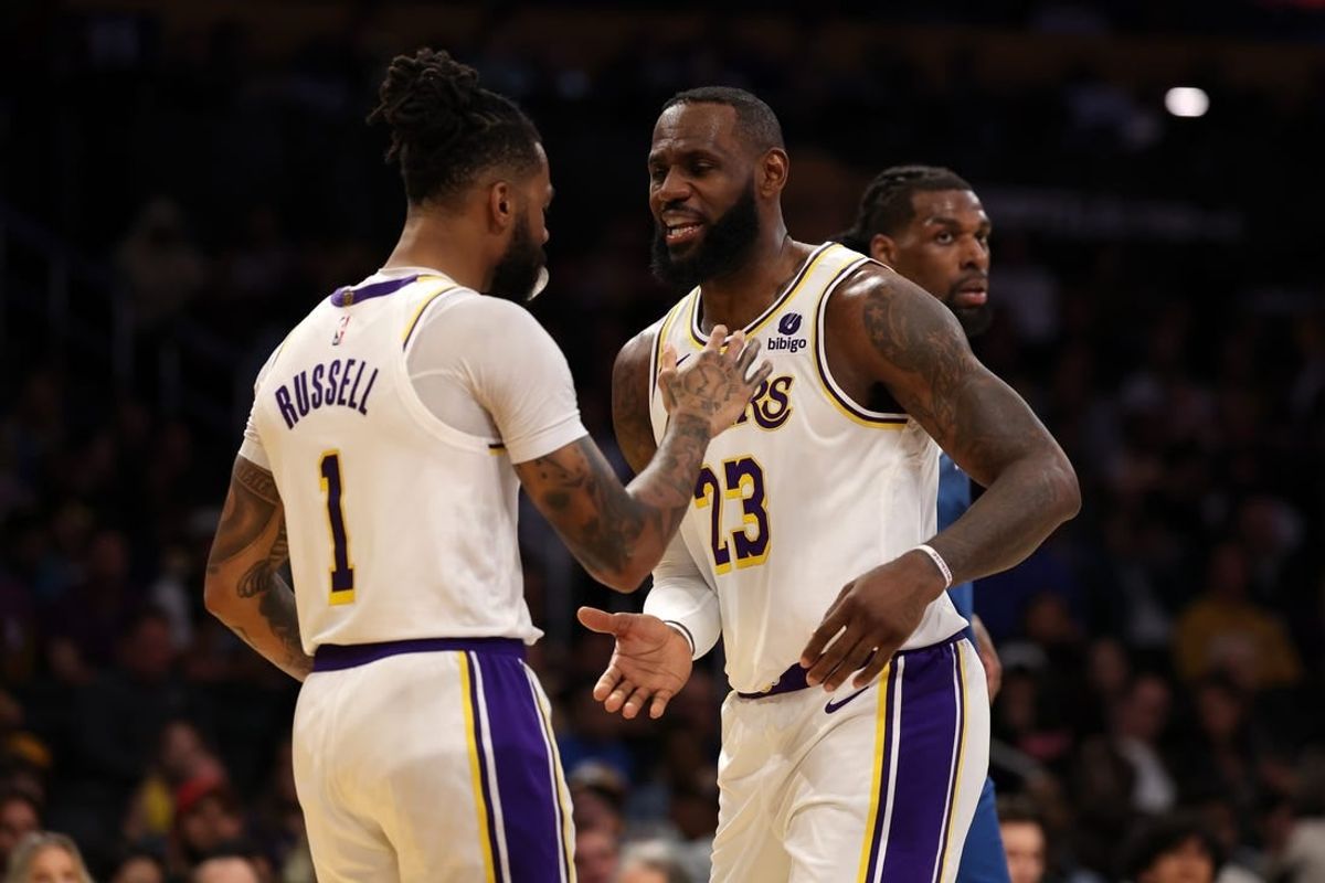 Mar 10, 2024; Los Angeles, California, USA;  Los Angeles Lakers forward LeBron James (23) greets guard D'Angelo Russell (1) after Russell scored a basket during the second quarter against the Minnesota Timberwolves at Crypto.com Arena.