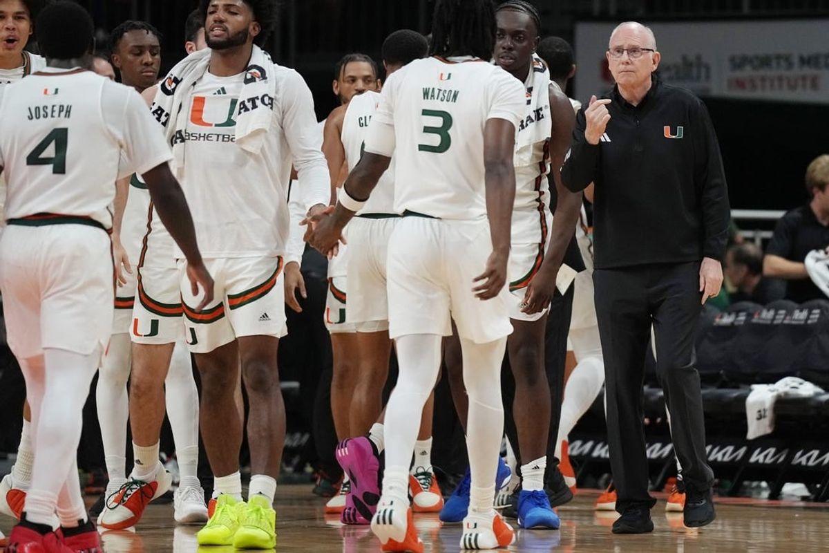 Nov 6, 2023; Coral Gables, Florida, USA; Miami (Fl) Hurricanes head coach Jim Larranaga talks to his team in the first half against the N.J.I.T Highlanders at Watsco Center.