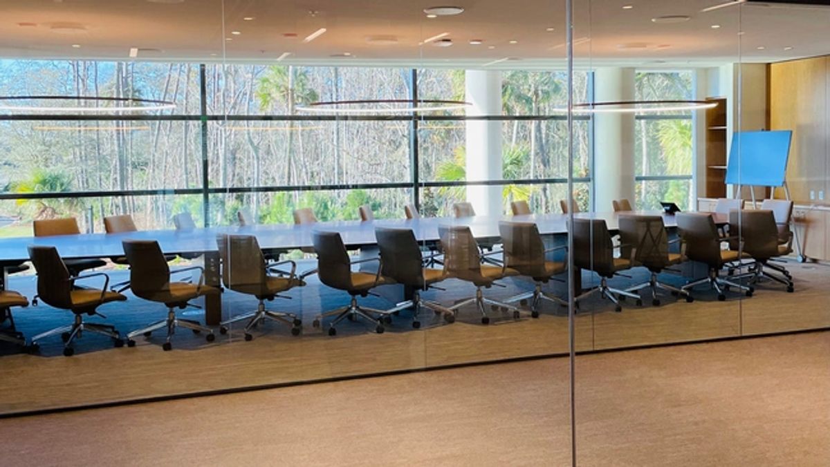 PGA Tour commissioner Jay Monahan's conference room, overlooking a patch of woods near the Tour's new Global Home.

Commissioner Conference Room