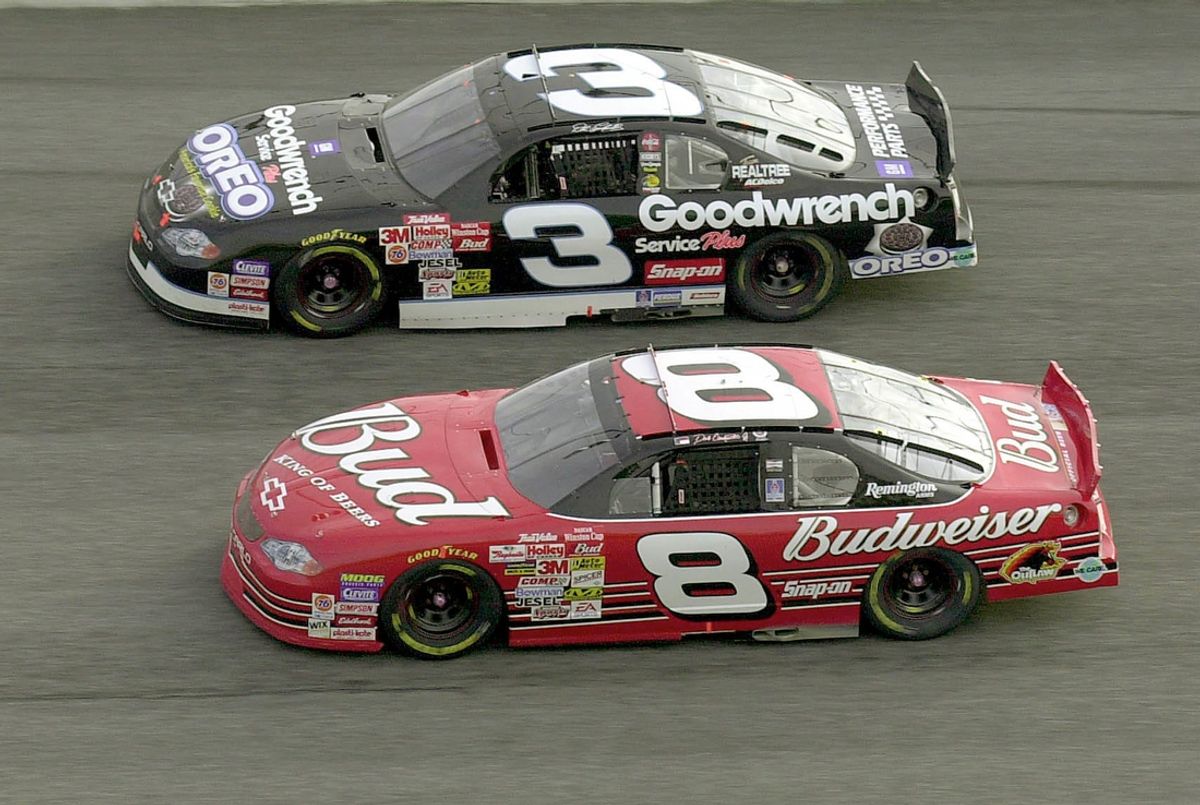 Dale Earnhardt, background, and his son, Dale Earnhardt Jr., run side by side in turn 2 during the Budweiser Shootout at Daytona International Speedway, Sunday, Feb. 11, 2001, in Daytona Beach, Fla.

Dale Earnhardt