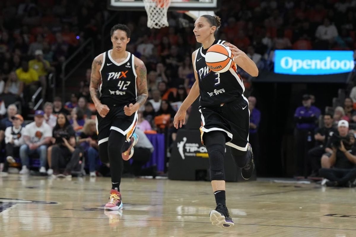 May 21, 2023; Phoenix, Arizona, USA; Phoenix Mercury guard Diana Taurasi (3) and center Brittney Griner (42) run up court against the Chicago Sky in the first half at Footprint Center.