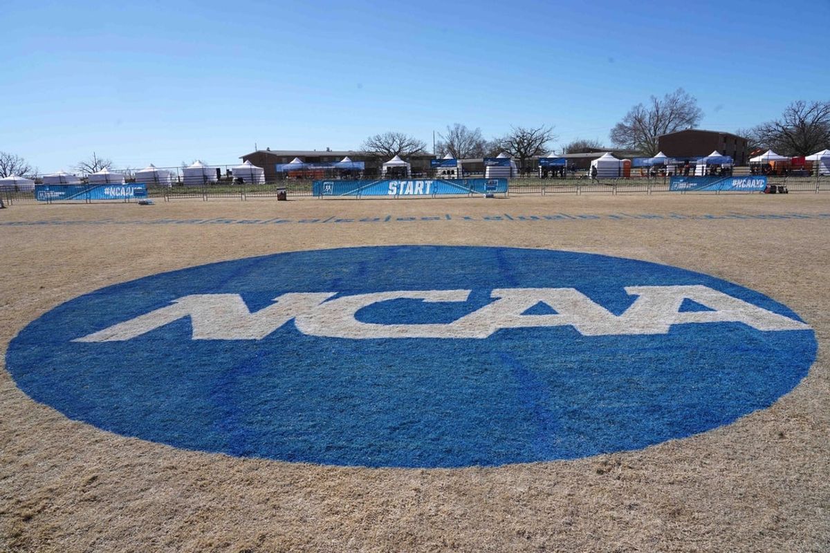 Mar 15, 2021; Stillwater, Oklahoma, USA; A general overall view of the NCAA logo at the staring line of the NCAA Cross County Championships at the OSU Cross Country Course. Mandatory Credit: Kirby Lee-Imagn Images