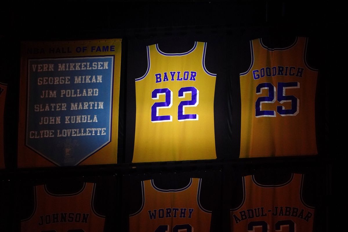 Mar 31, 2021; Los Angeles, California, USA; The retired jersey of the late Elgin Baylor (22) is illuminated during the game between the Milwaukee Bucks and the Los Angeles Lakers at Staples Center. Mandatory Credit: Kirby Lee-Imagn Images