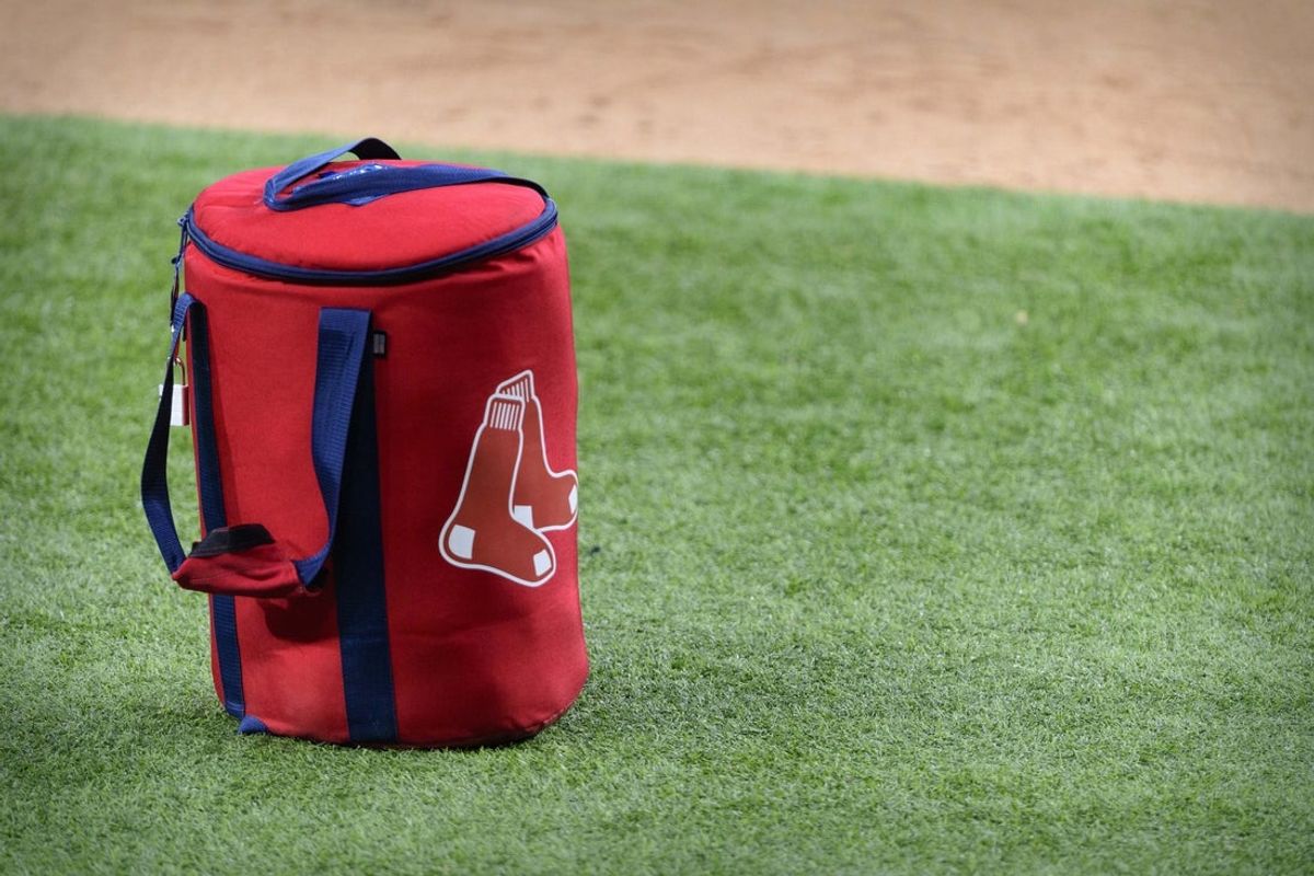 Apr 29, 2021; Arlington, Texas, USA; A view of the Boston Red Sox logo and a field bag during batting practice before the game between the Texas Rangers and the Boston Red Sox at Globe Life Field. Mandatory Credit: Jerome Miron-Imagn Images