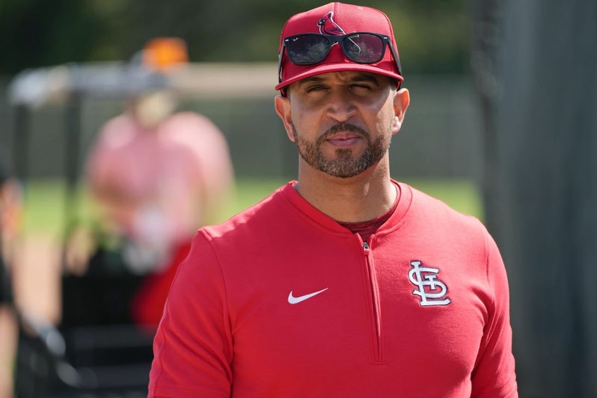 Feb 15, 2024; Jupiter, FL, USA;  St. Louis Cardinals manager Oliver Marmol (37) checks on his team during workouts at spring training.