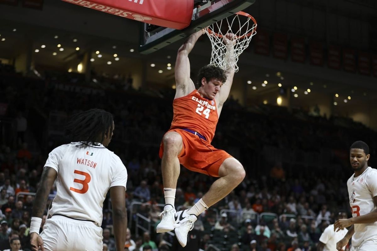 Jan 3, 2024; Coral Gables, Florida, USA; Clemson Tigers center PJ Hall (24) dunks the basketball against the Miami Hurricanes during the first half at Watsco Center.