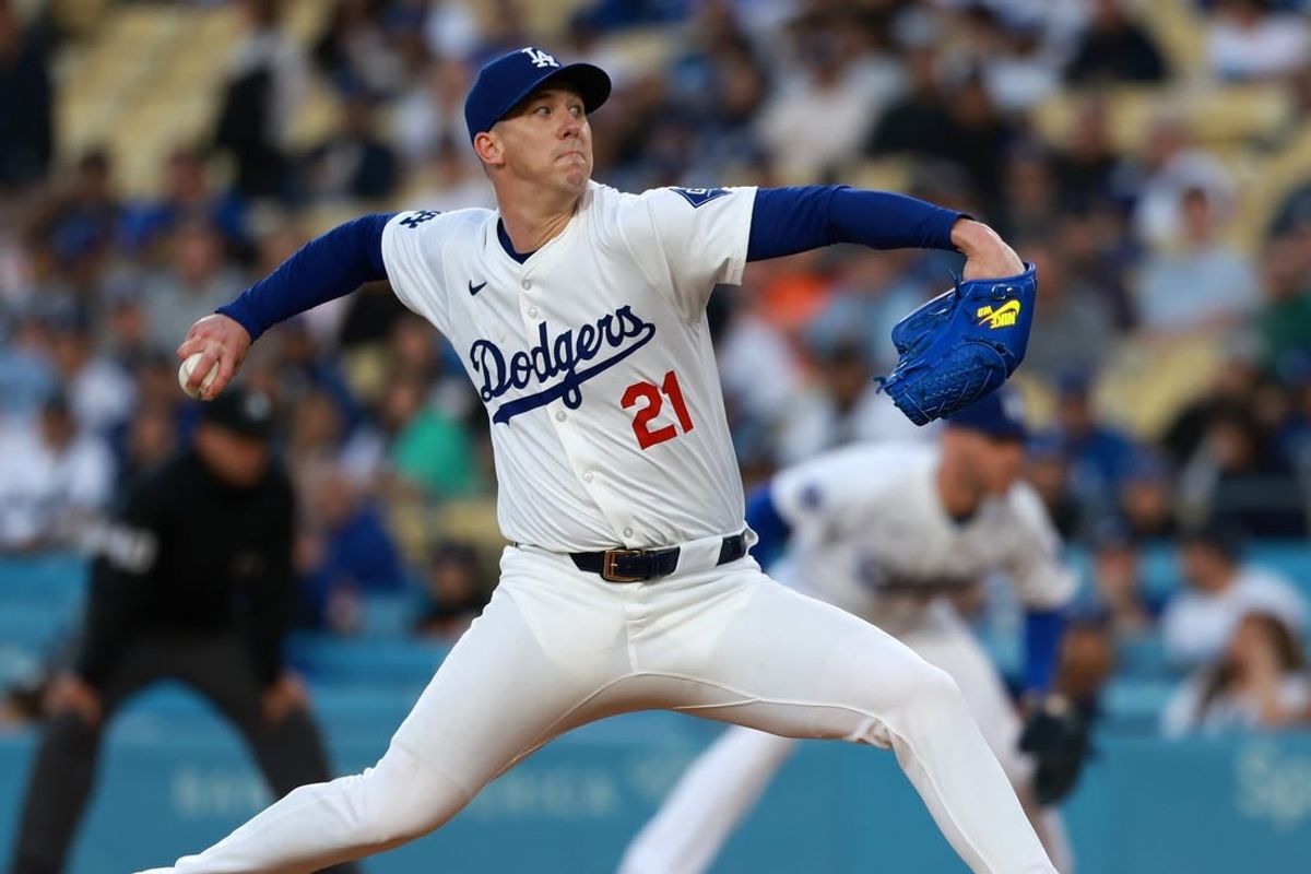 May 6, 2024; Los Angeles, California, USA;  Los Angeles Dodgers starting pitcher Walker Buehler (21) pitches during the first inning against the Miami Marlins at Dodger Stadium.