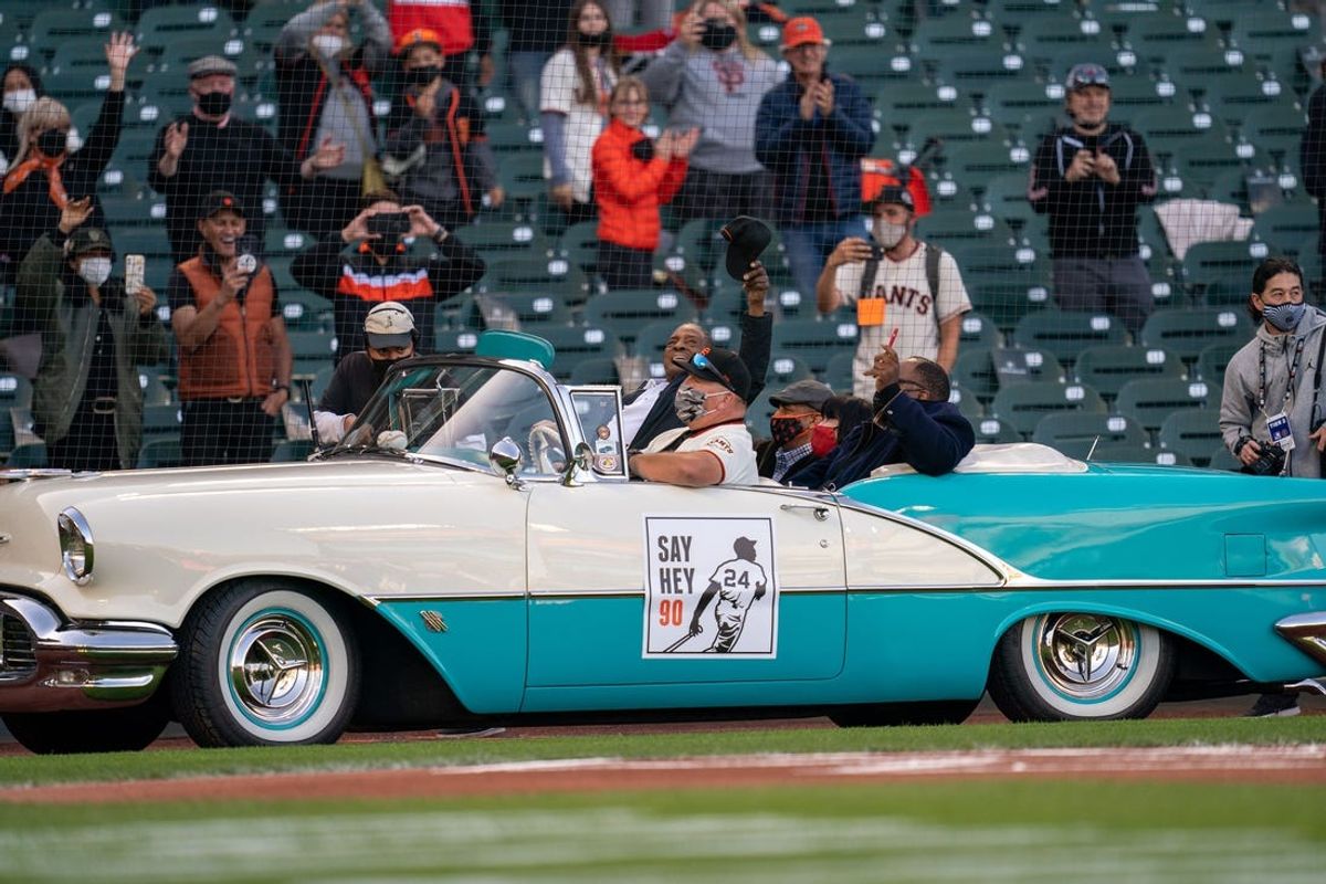 May 7, 2021; San Francisco, California, USA;  San Francisco Giants retired center fielded Willie Mays (24) celebrates his 90th birthday with fans at Oracle Park before the start of the game against the San Diego Padres. Mandatory Credit: Neville E. Guard-USA TODAY Sports