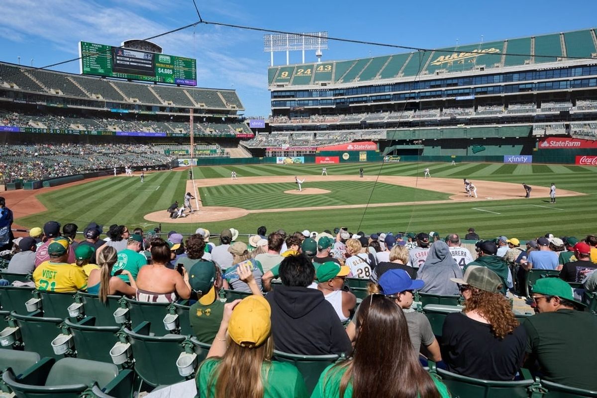 Sep 24, 2023; Oakland, California, USA; Fans watch Detroit Tigers designated hitter Miguel Cabrera (24) swing at a pitch against Oakland Athletics starting pitcher JP Sears (38) during the fifth inning at Oakland-Alameda County Coliseum.