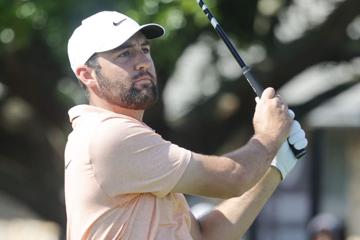 Mar 7, 2024; Orlando, Florida, USA;  Scottie Scheffler hits his drive on the first tee during the first round of the Arnold Palmer Invitational golf tournament.