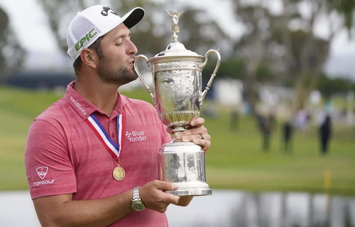 Jun 20, 2021; San Diego, California, USA; Jon Rahm celebrates and kisses the trophy after winning he U.S. Open golf tournament at Torrey Pines Golf Course. Mandatory Credit: Michael Madrid-Imagn Images