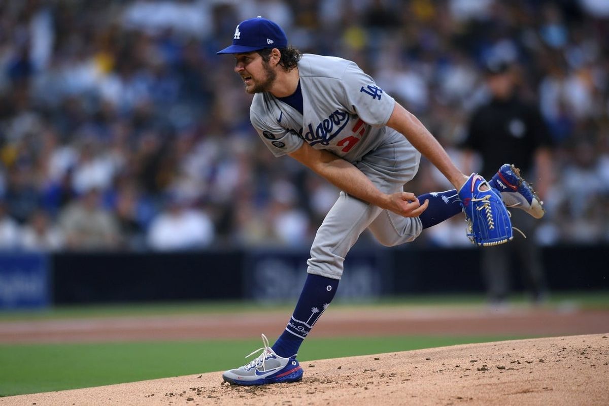 Jun 23, 2021; San Diego, California, USA; Los Angeles Dodgers starting pitcher Trevor Bauer (27) throws a pitch against the San Diego Padres during the first inning at Petco Park. Mandatory Credit: Orlando Ramirez-Imagn Images