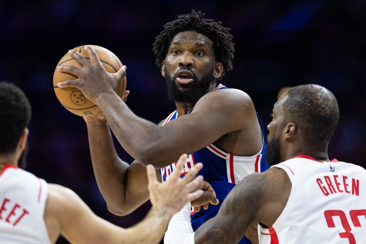 Jan 15, 2024; Philadelphia, Pennsylvania, USA; Philadelphia 76ers center Joel Embiid (21) controls the ball against Houston Rockets forward Jeff Green (32) during the second quarter at Wells Fargo Center.