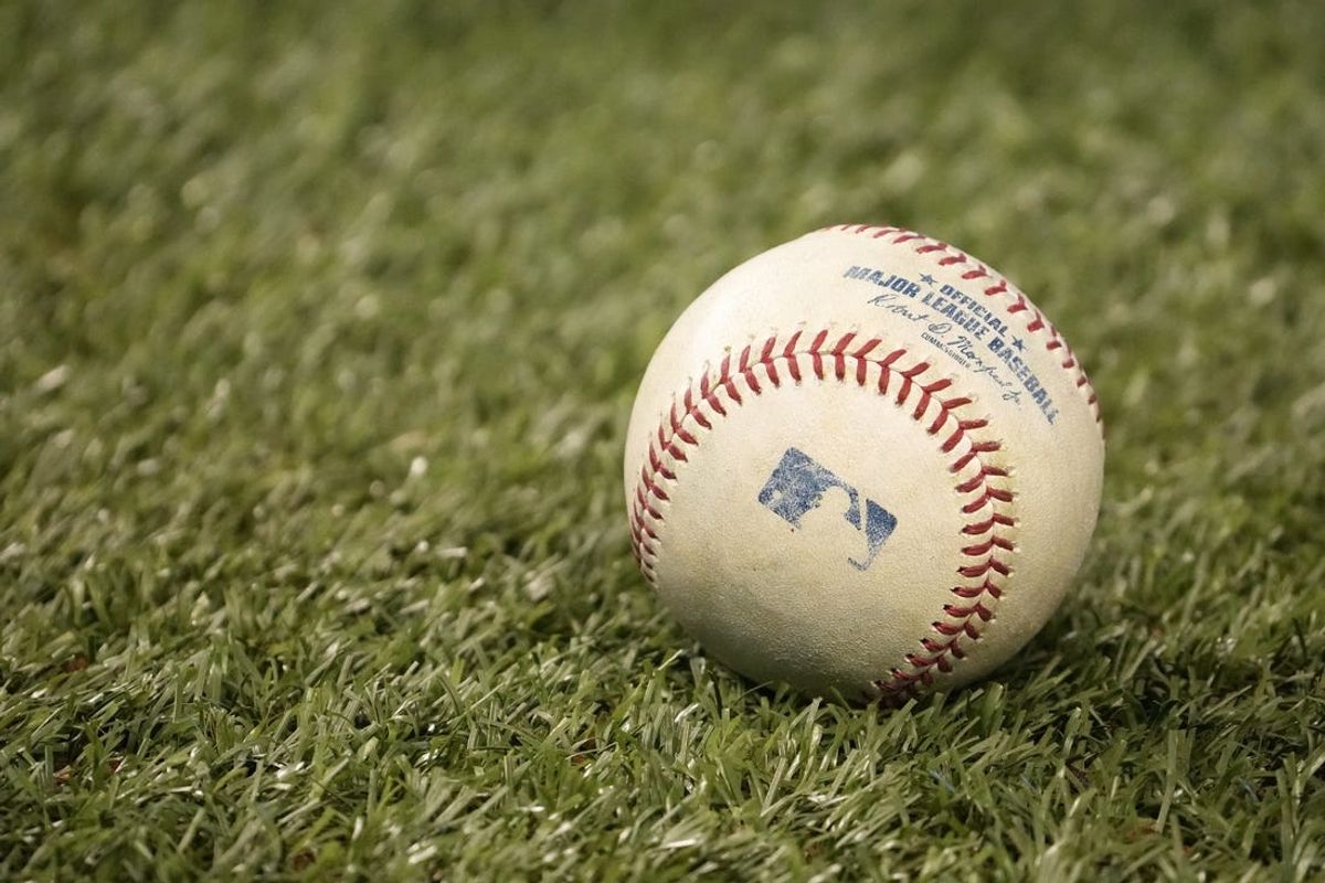 Jul 9, 2021; Miami, Florida, USA; A general view of a baseball on the infield grass prior to the game between the Maimi Marlins and Atlanta Braves at loanDepot park. Mandatory Credit: Jasen Vinlove-USA TODAY Sports