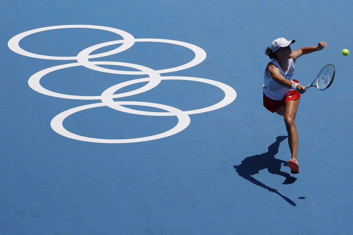 Iga Swiatek of Poland hits a forehand (file photo) in a women's singles first round match during the Tokyo Games. Mandatory Credit: Geoff Burke-USA TODAY Network