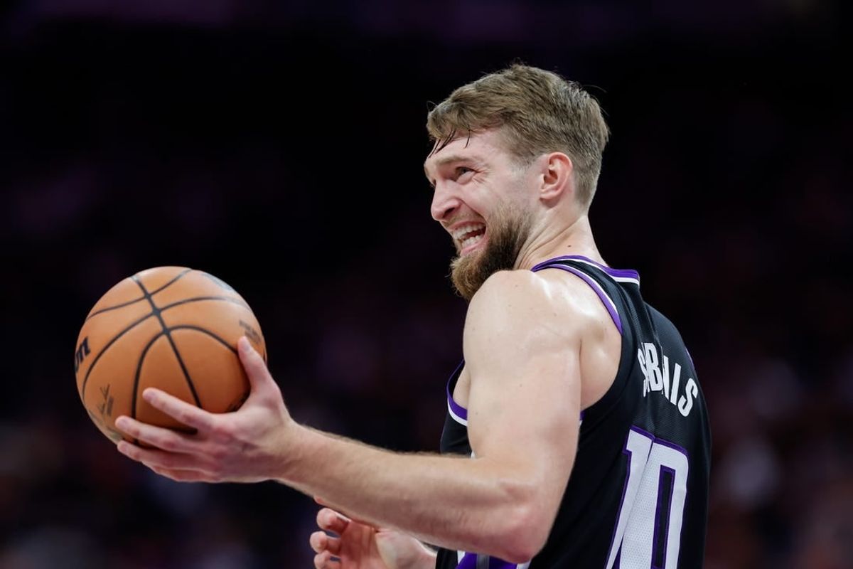 Apr 2, 2024; Sacramento, California, USA; Sacramento Kings forward Domantas Sabonis (10) smiles during the third quarter against the LA Clippers at Golden 1 Center.