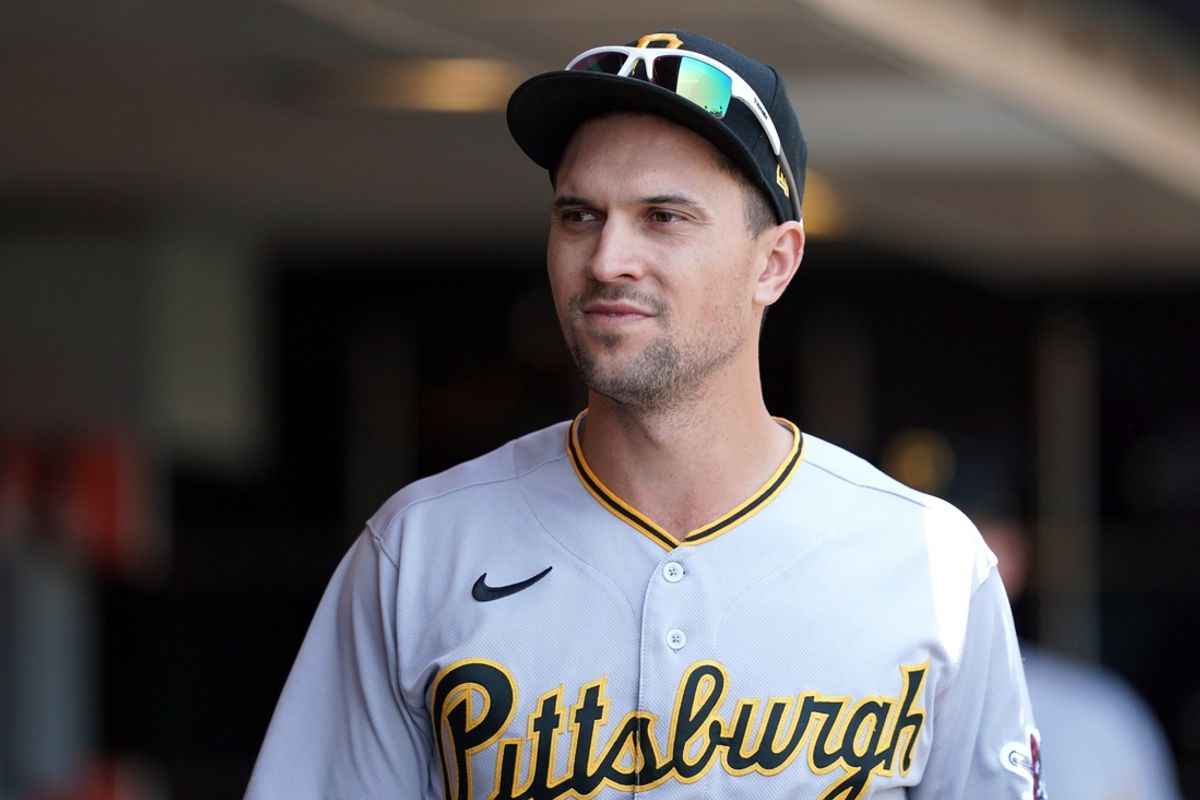 Jul 25, 2021; San Francisco, California, USA; Pittsburgh Pirates second baseman Adam Frazier (26) walks in the dugout before the game against the San Francisco Giants at Oracle Park. Mandatory Credit: Darren Yamashita-Imagn Images