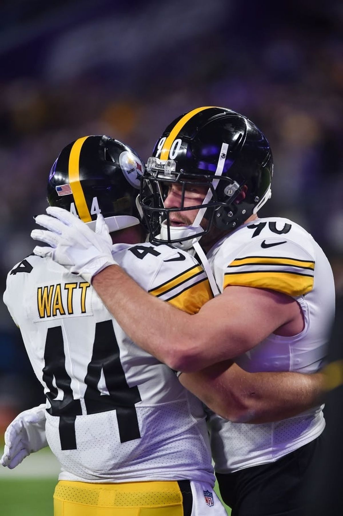Dec 9, 2021; Minneapolis, Minnesota, USA; Pittsburgh Steelers outside linebacker T.J. Watt (right) and his brother fullback Derek Watt (44) embrace before the game against the Minnesota Vikings at U.S. Bank Stadium.