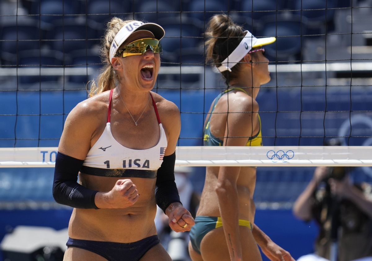 Aug 6, 2021; Tokyo, Japan; April Ross (USA) celebrates a point against Australia in the women's gold medal beach volleyball match during the Tokyo 2020 Olympic Summer Games at Shiokaze Park. Mandatory Credit: Robert Hanashiro-Imagn Images