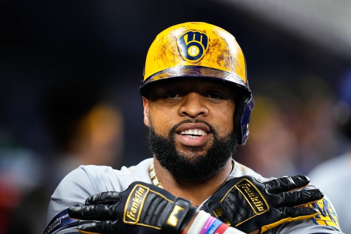 Sep 23, 2023; Miami, Florida, USA; Milwaukee Brewers first baseman Carlos Santana (41) celebrates hitting a three run home run against the Miami Marlins during the sixth inning at loanDepot Park.