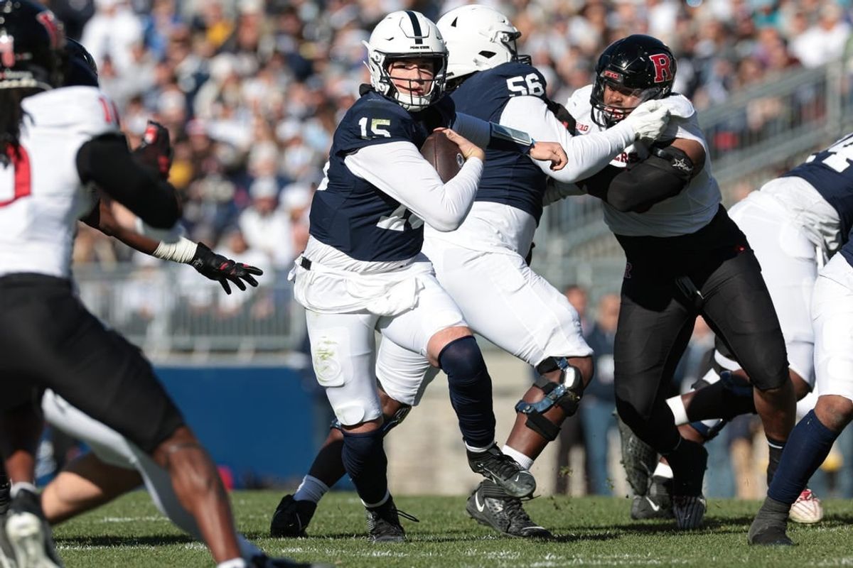 Nov 18, 2023; University Park, Pennsylvania, USA; Penn State Nittany Lions quarterback Drew Allar (15) carries the ball during the first half against the Rutgers Scarlet Knights at Beaver Stadium.