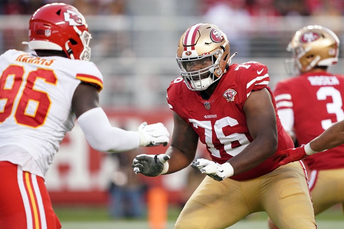 San Francisco 49ers offensive tackle Jaylon Moore (76) blocks Kansas City Chiefs defensive end Demone Harris (96) during the third quarter at Levi's Stadium. Mandatory Credit: Darren Yamashita-Imagn Images