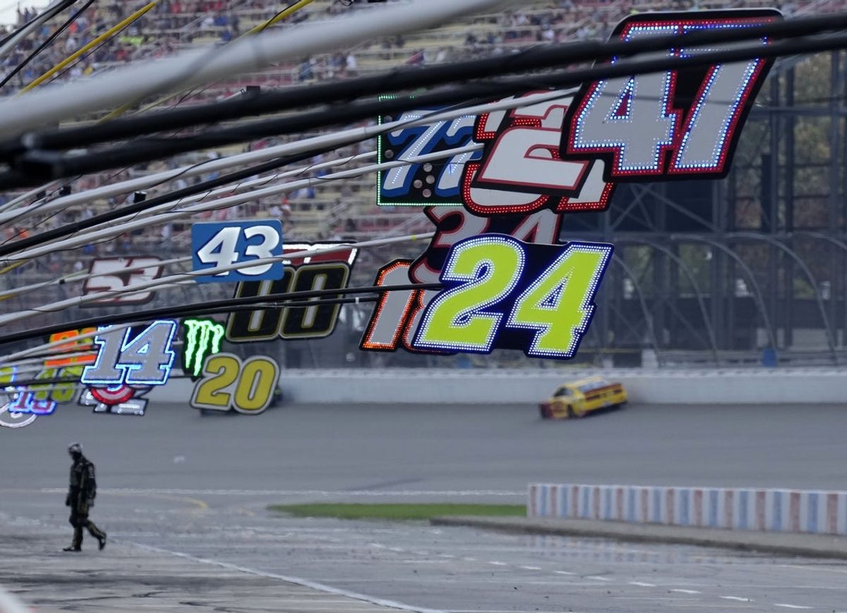 Aug 22, 2021; Brooklyn, Michigan, USA; Pit signs on pit road during the FireKeepers Casino 400 at Michigan International Speedway. Mandatory Credit: Mike Dinovo-Imagn Images