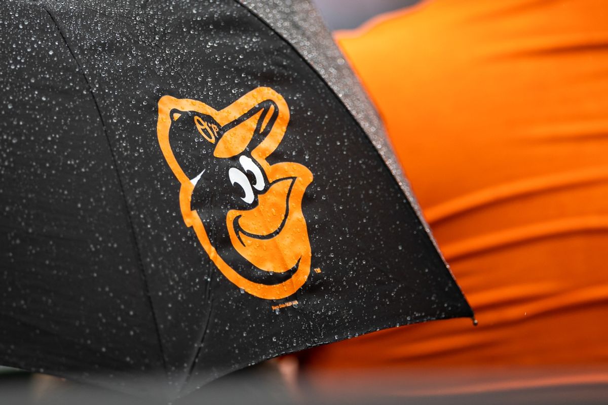Aug 22, 2021; Baltimore, Maryland, USA; A Baltimore Orioles logo is seen on an umbrella during the game between the Baltimore Orioles and the Atlanta Braves at Oriole Park at Camden Yards. Mandatory Credit: Scott Taetsch-Imagn Images