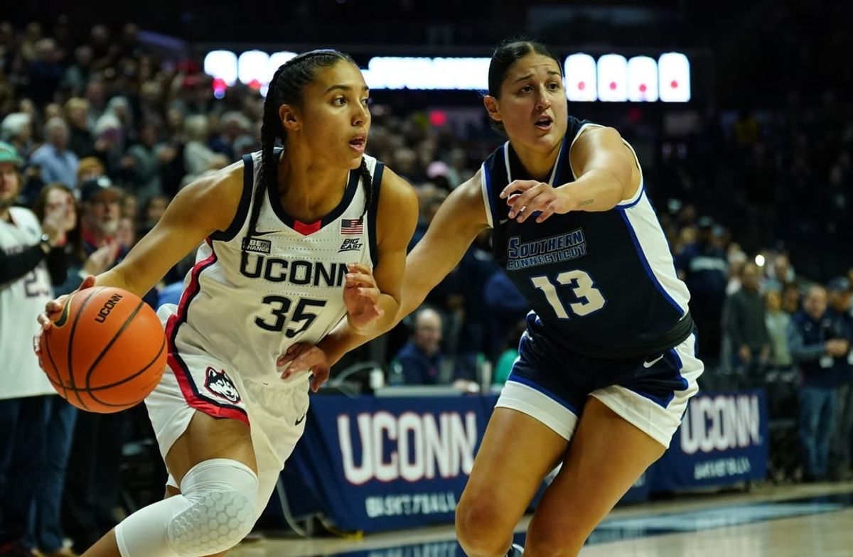 Nov 4, 2023; Storrs, CT, USA; UConn Huskies guard Azzi Fudd (35) drives the ball against Southern Connecticut State University guard Julianna Bonilla (13) in the first half at Gampel Pavillion.