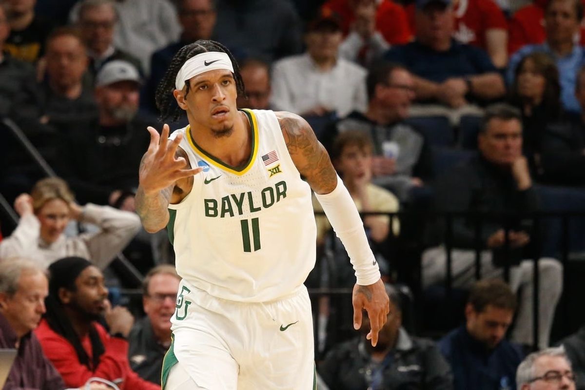 Mar 22, 2024; Memphis, TN, USA; Baylor Bears forward Jalen Bridges (11) reacts after a three-point shot against the Colgate Raiders during the second half of the NCAA Tournament First Round at FedExForum.