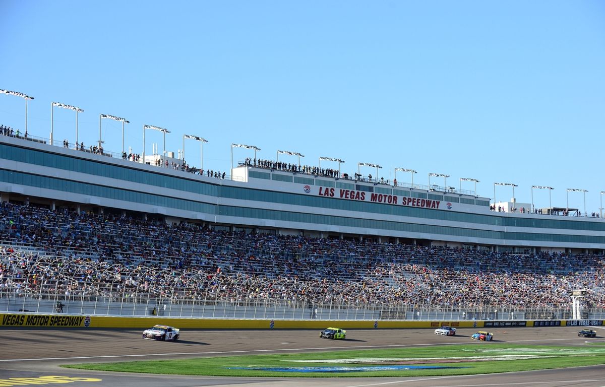 Sep 26, 2021; Las Vegas, Nevada, USA; General view of main grandstand as NASCAR Cup Series driver Denny Hamlin (11) leads driver Ryan Blaney (12) driver B.J. McLeod (78) driver Kyle Busch (18) and driver Kyle Larson (5) during the South Point 400 at Las Vegas Motor Speedway. Mandatory Credit: Gary A. Vasquez-Imagn Images