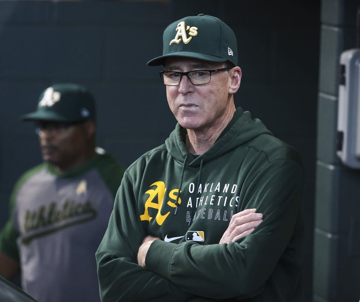 Oct 3, 2021; Houston, Texas, USA; Oakland Athletics manager Bob Melvin (6) looks on from the dugout before the start of the game against the Houston Astros at Minute Maid Park. Mandatory Credit: Troy Taormina-Imagn Images