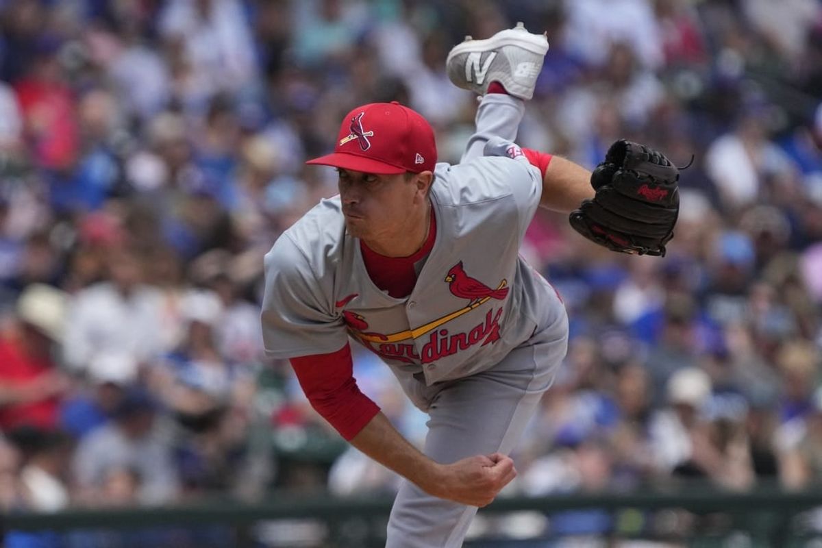 Mar 26, 2024; Mesa, Arizona, USA; St. Louis Cardinals starting pitcher Kyle Gibson (44) throws against the Chicago Cubs in the first inning at Sloan Park.