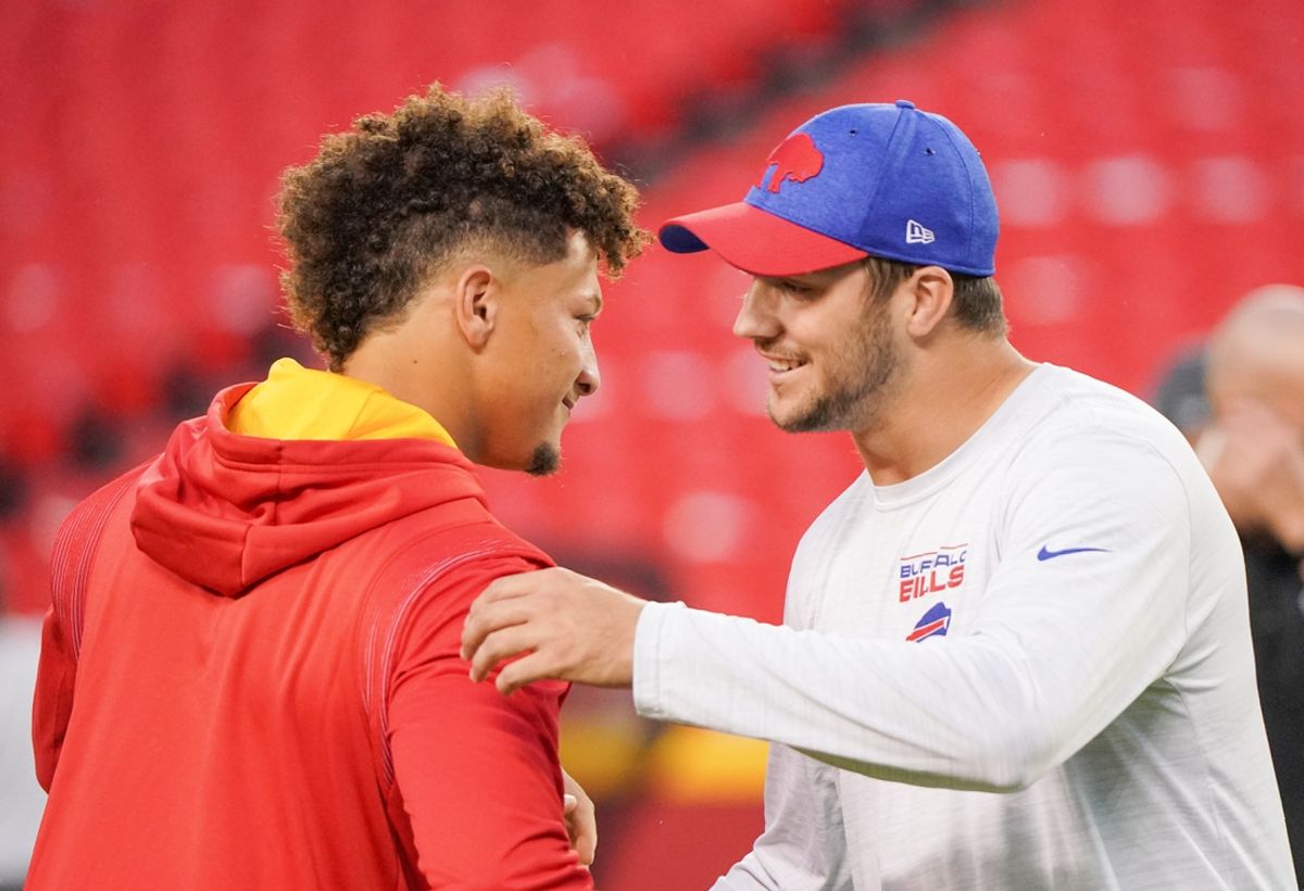 Oct 10, 2021; Kansas City, Missouri, USA; Kansas City Chiefs quarterback Patrick Mahomes (15) talks with Buffalo Bills quarterback Josh Allen (17) before warm ups at GEHA Field at Arrowhead Stadium. Mandatory Credit: Denny Medley-Imagn Images
