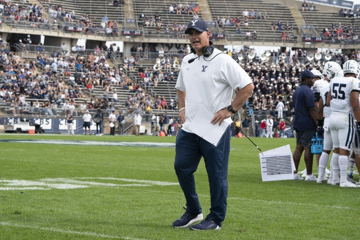 Oct 16, 2021; East Hartford, Connecticut, USA; Yale Bulldogs head coach Tony Reno yells to an official during the first half against the Connecticut Huskies at Rentschler Field at Pratt & Whitney Stadium. Mandatory Credit: Gregory Fisher-Imagn Images